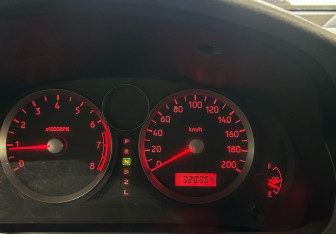 Подержанный автомобиль Suzuki Liana Wagon 2005 года (14 фото)