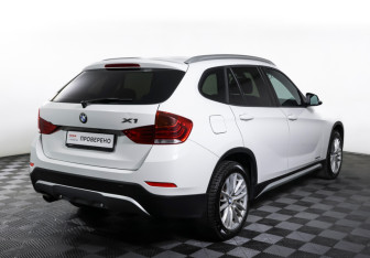 Подержанный автомобиль BMW X1 2013 года (5 фото)