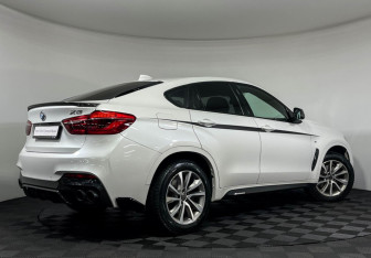 Подержанный автомобиль BMW X6 2019 года (2 фото)
