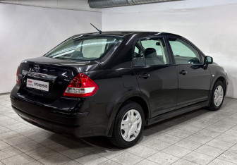 Подержанный автомобиль Nissan Tiida Sedan 2013 года (5 фото)