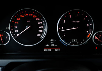 Подержанный автомобиль BMW X5 2014 года (11 фото)