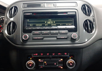 Подержанный автомобиль Volkswagen Tiguan 2013 года (14 фото)