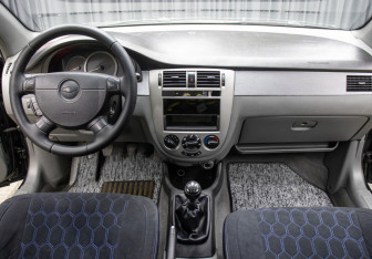 Подержанный автомобиль Chevrolet Lacetti Sedan 2012 года (14 фото)