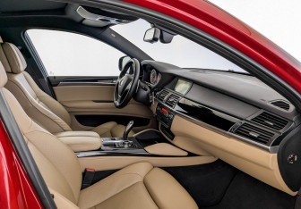 Подержанный автомобиль BMW X6 M 2011 года (11 фото)