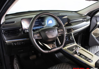 Подержанный автомобиль Exeed TXL 2023 года (13 фото)