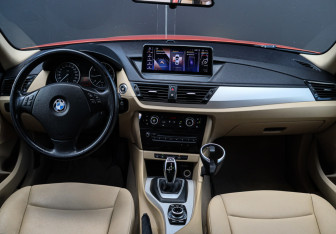 Подержанный автомобиль BMW X1 2013 года (9 фото)