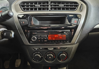 Подержанный автомобиль Peugeot 301 2014 года (13 фото)