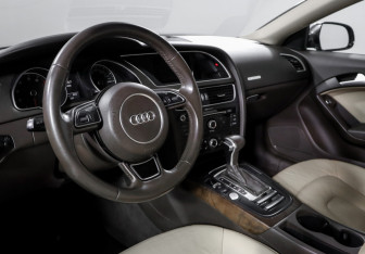 Подержанный автомобиль Audi A5 Coupe 2014 года (14 фото)