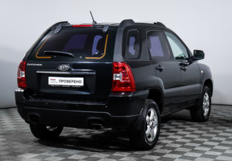 Подержанный автомобиль Kia Sportage 2009 года (5 фото)