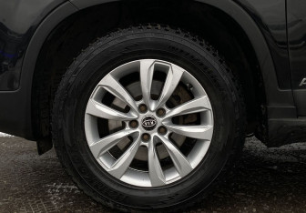 Подержанный автомобиль Kia Sorento 2013 года (9 фото)