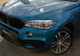 Подержанный автомобиль BMW X6 2018 года (29 фото)