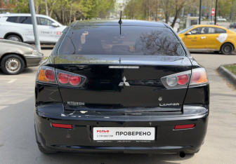 Подержанный автомобиль Mitsubishi Lancer Sedan 2011 года (6 фото)