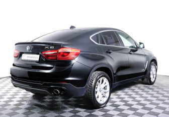 Подержанный автомобиль BMW X6 2015 года (5 фото)