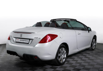 Подержанный автомобиль Peugeot 308 Convertible 2009 года (5 фото)