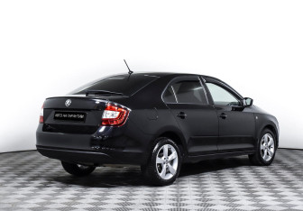 Подержанный автомобиль Skoda Rapid Liftback 2015 года (3 фото)