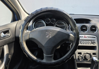 Подержанный автомобиль Peugeot 308 Hatchback 2010 года (12 фото)