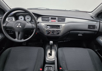 Подержанный автомобиль Mitsubishi Lancer Sedan 2009 года (11 фото)