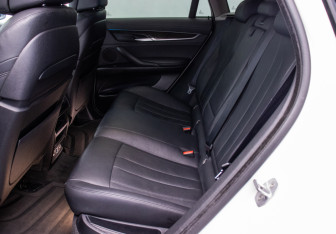Подержанный автомобиль BMW X6 2015 года (11 фото)