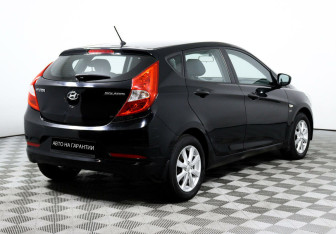 Подержанный автомобиль Hyundai Solaris Hatchback 2014 года (5 фото)