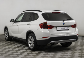 Подержанный автомобиль BMW X1 2013 года (7 фото)