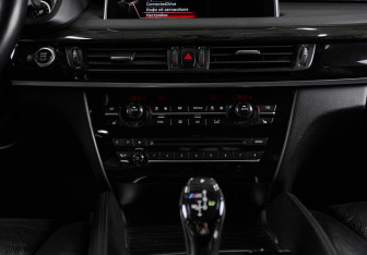 Подержанный автомобиль BMW X6 2014 года (19 фото)