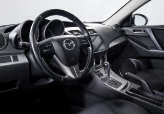 Подержанный автомобиль Mazda 3 Hatchback 2010 года (14 фото)