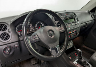 Подержанный автомобиль Volkswagen Tiguan 2014 года (13 фото)