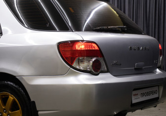 Подержанный автомобиль Subaru Impreza Wagon 2004 года (10 фото)