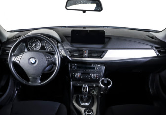 Подержанный автомобиль BMW X1 2014 года (12 фото)