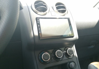 Подержанный автомобиль Nissan Qashqai+2 2012 года (14 фото)