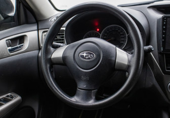 Подержанный автомобиль Subaru Impreza Hatchback 2008 года (15 фото)