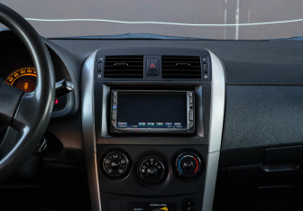 Подержанный автомобиль Toyota Corolla Sedan 2007 года (10 фото)