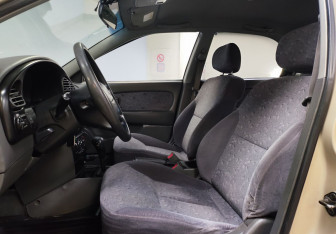 Подержанный автомобиль Kia Spectra Sedan 2007 года (10 фото)