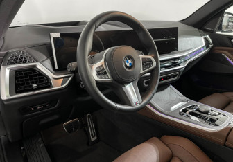 Подержанный автомобиль BMW X5 2025 года (12 фото)