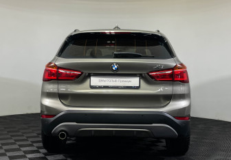 Подержанный автомобиль BMW X1 2017 года (4 фото)