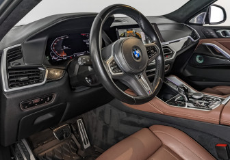 Подержанный автомобиль BMW X6 2023 года (15 фото)