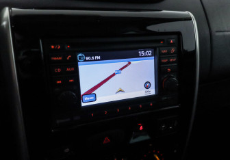 Подержанный автомобиль Nissan Terrano 2014 года (9 фото)