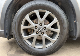 Подержанный автомобиль Mazda CX-5 2011 года (9 фото)