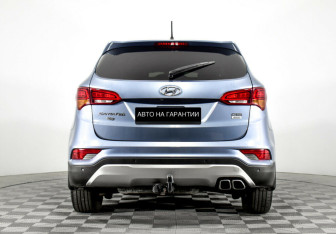 Подержанный автомобиль Hyundai Santa Fe 2016 года (4 фото)