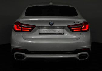 Подержанный автомобиль BMW X6 2016 года (20 фото)