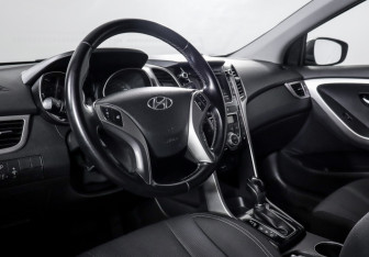 Подержанный автомобиль Hyundai i30 Hatchback 2014 года (14 фото)