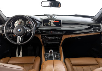Подержанный автомобиль BMW X6 M 2016 года (14 фото)