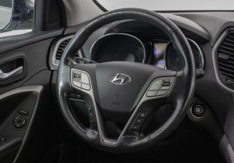 Подержанный автомобиль Hyundai Santa Fe 2014 года (15 фото)
