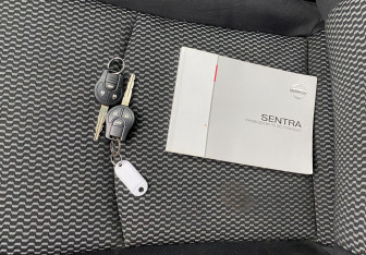 Подержанный автомобиль Nissan Sentra Sedan 2014 года (18 фото)