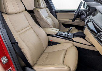 Подержанный автомобиль BMW X6 M 2011 года (25 фото)