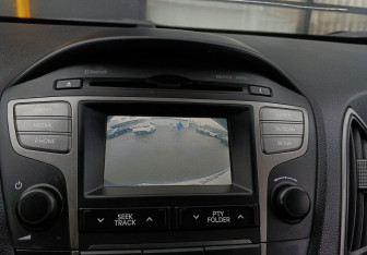 Подержанный автомобиль Hyundai ix35 2014 года (13 фото)