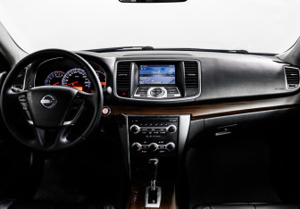 Подержанный автомобиль Nissan Teana 2010 года (11 фото)