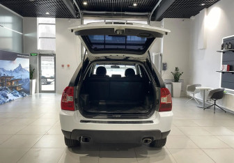 Подержанный автомобиль Kia Sportage 2010 года (7 фото)