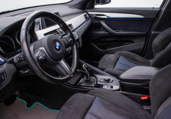 Подержанный автомобиль BMW X1 2018 года (10 фото)