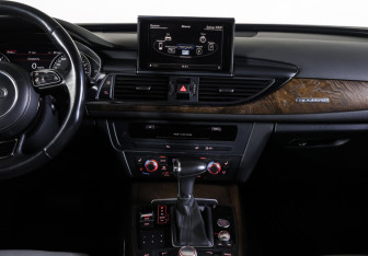 Подержанный автомобиль Audi A6 allroad 2012 года (13 фото)